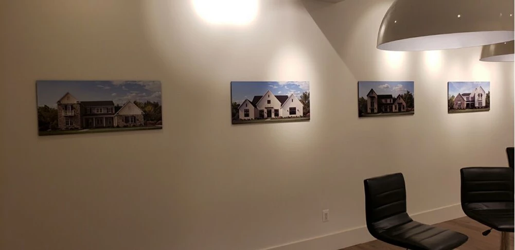 Toll Brothers wanted a simple yet dimensional display to show off their new homes currently in development. Printed photos on PVC, mounted to the wall is how this was presented.