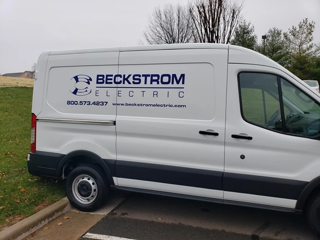 Vehicle branding on a Beckstrom Electric van. Their logo and contact info installed.