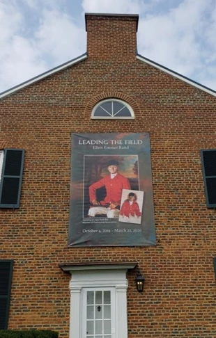 This 8 foot by 12 foot banner was created for the National Sporting Library & Museum; installed up high on their brick building.