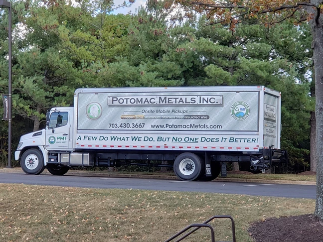 This vehicle was wrapped at our own shop in Dulles. This truck from Potomac Metals is 24 feet long!