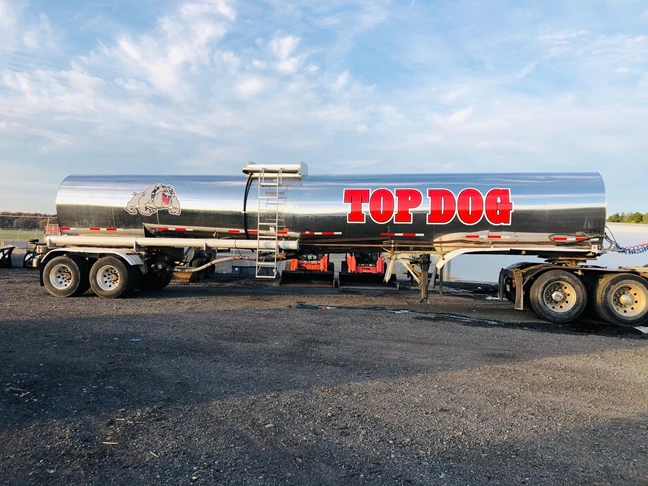 Top Dog needed some branding on their tanker truck. We installed their name and logo to the sides and rear.