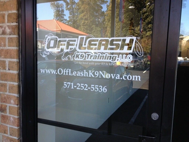 Decal cut door logo and contact info was installed for Off Leash K9 Training. Clean and simple.