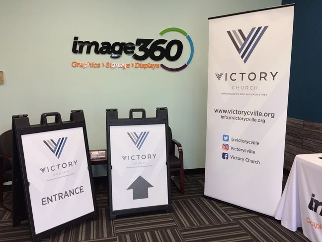 Victory Church needed some entrance signage (A-Frames) and a banner labeling their social medias.