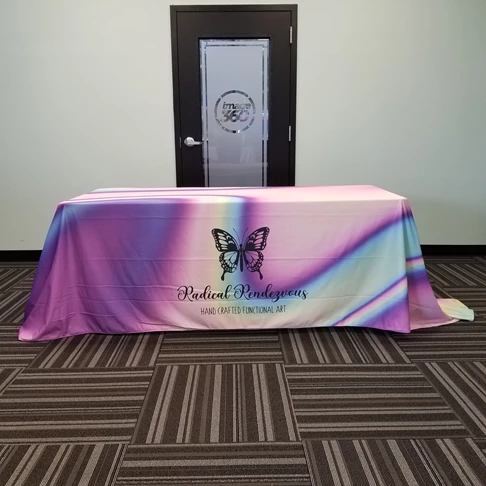 This beautifully printed table cover is 8ft long. Our fabrics are printed with sublimated inks, which are washer friendly!